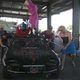 Illustration for article titled Cannonball Bandits Escalade Gets Black Flag, Tigers Girlfriends Enraged!